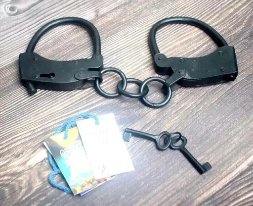 Handcuff vintage cast iron - vintage,