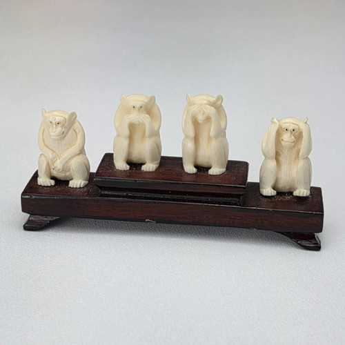 Three wise monkeys carved - three,