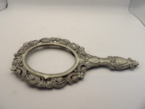 Vintage hand held metal mirror