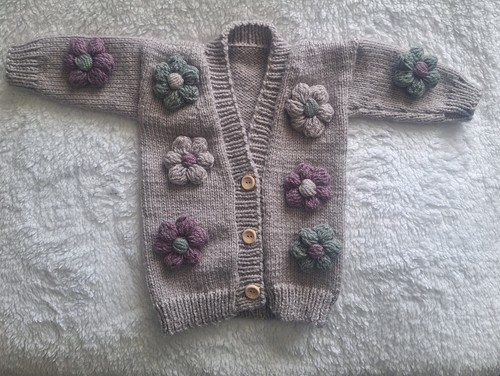 Hand knitted baby - hand,
