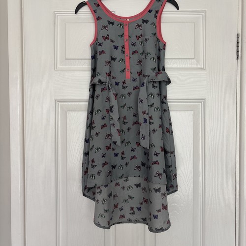 Next grey butterfly - next, design