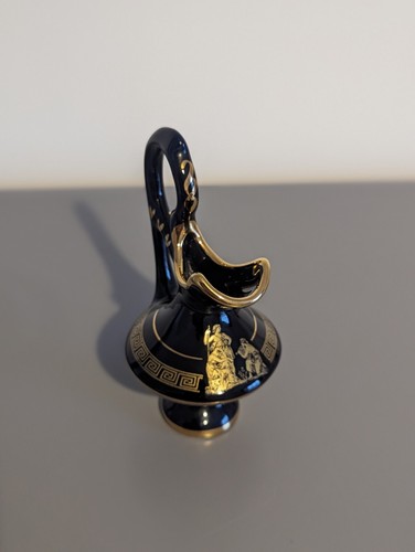 Black and gold vase hand - and, made