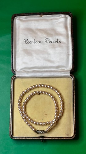 Peerless faux pearls with art - peerless,