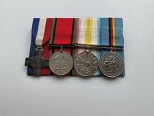 Set Of Four Mounted Full Size Medals.