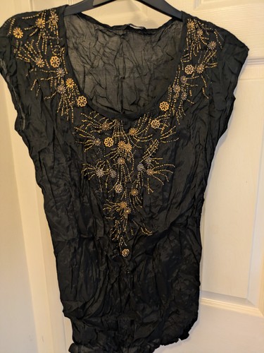 Sheer black top with - top,
