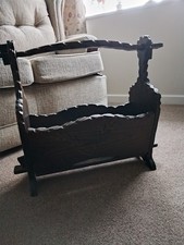 Vintage Dark wood oak magazine rack collapsable Used God condition.