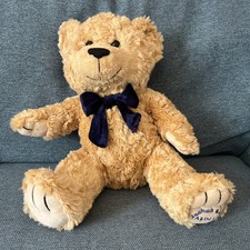 Joshua bear with bow - bear, cuddly