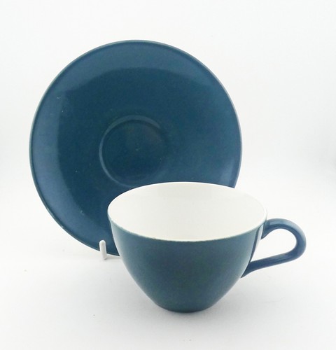 Poole pottery teacup and - pottery,