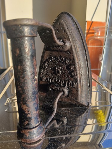 Antique cast iron sad - cast,
