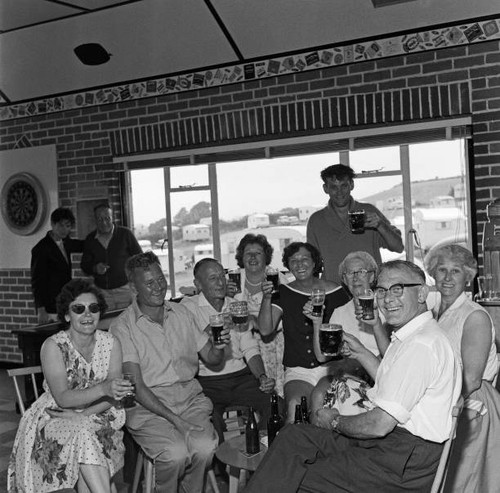 Holidaymakers enjoy drink at - holidaymakers,