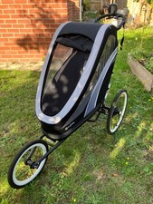 Black Cybex Zeno multisport running pushchair and bike hitch