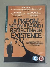 A Pigeon Sat On a Branch