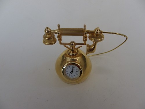 Miniature brass quartz clock - brass,