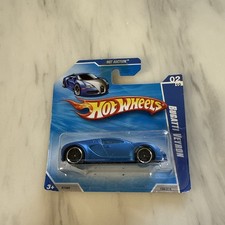 2010 Hot Wheels Bugatti Veyron Matt Blue dented blister 