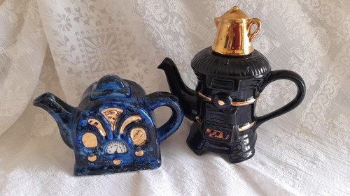 Two novelty teapots designed - teapots,,