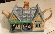 A NINA MOORE PAINTED SWINESIDE