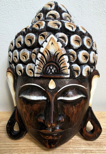 Hand carved wooden buddha - hand,