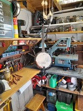 Banjo  Mahogany and Maple  Armrests.
