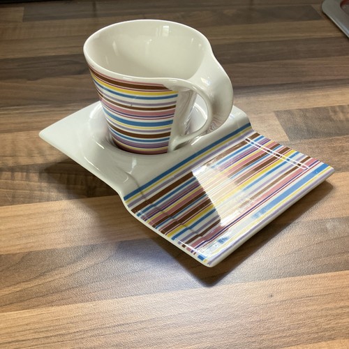 Small colourful mug with - small,