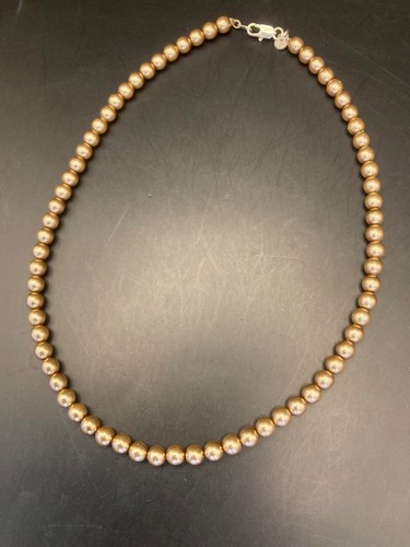 Short gold tone imitation - tone,