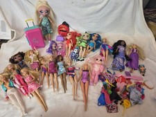 Large Bundle Barbie Dolls &