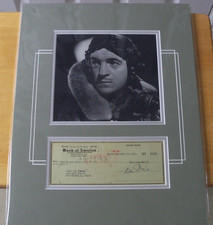 Large matted photo and check