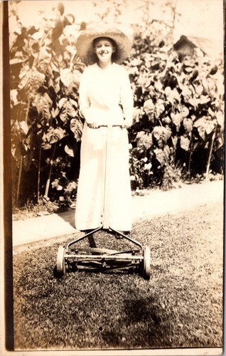 Antique rppc woman pushing - antique,