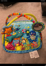 Baby Einstein play gym under