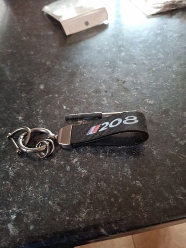 Peugeot 208 keyring and belt - peugeot,