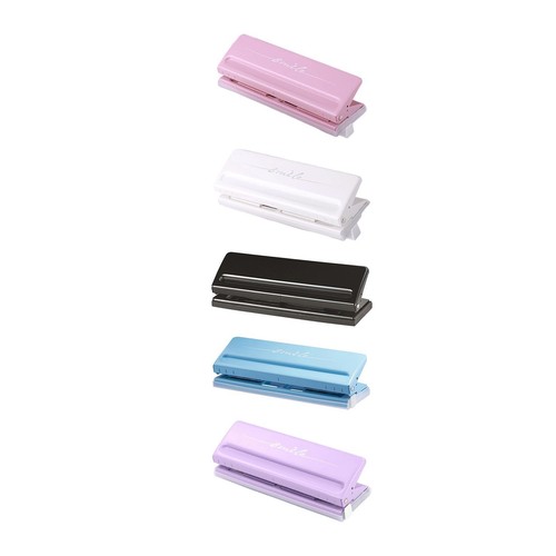 Hole puncher with positioning - with,