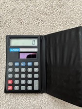 Casio SL 300 solar vintage pocket calculator with case fully functioning
