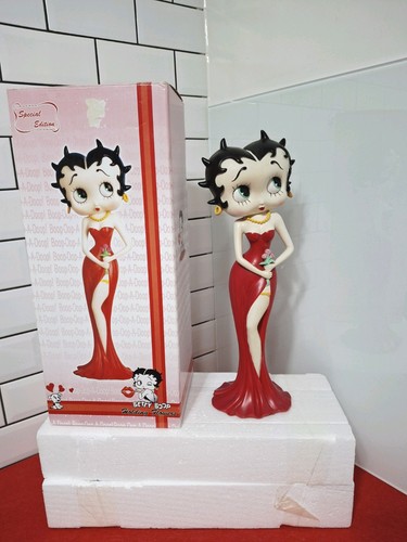 Betty boop figurine holding - betty,