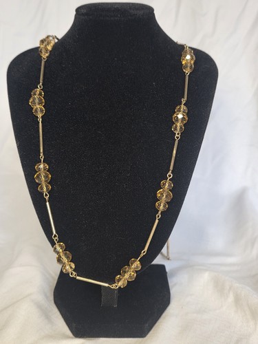 Gold and amber bead - 34",