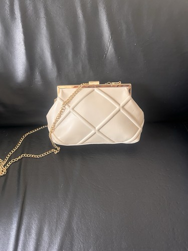 Beige quilted clutch - bag, with