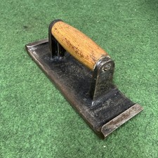 Vintage cast steel concrete edging trowel,