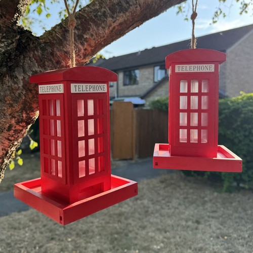 Telephone box hanging - telephone, bird