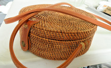 Round lined rattan handbag