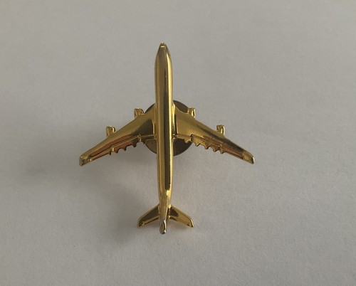 Gold coloured aircraft - gold,
