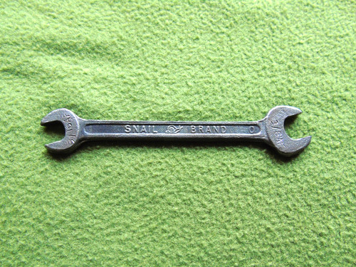 Vintage snail brand - brand, spanner