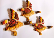 Flying ducks plaster wall