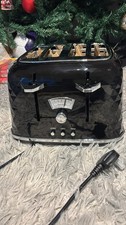 De'longhi 4 Slice Toaster In Black Glossy Finish Model CTJ 4003 BK