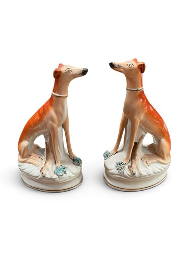 Staffordshire pair seated - of,