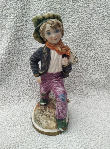 Capodimonte young boy figurine
