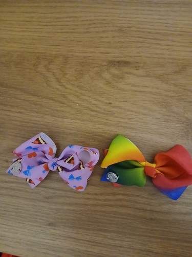 Two small jojo bows one - , purple