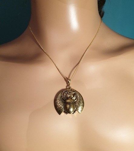 Golden scarab beetle amulet - golden,