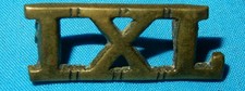 IXL 9th QUEENS ROYAL LANCERS BRITISH MILITARY BRASS SHOULDER TITLE BADGE GENUINE