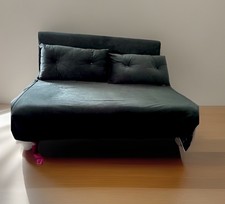 Green Suede 3 Seater, Sofa Bed. It Is a convenient sofa bed, With 2 Pillows