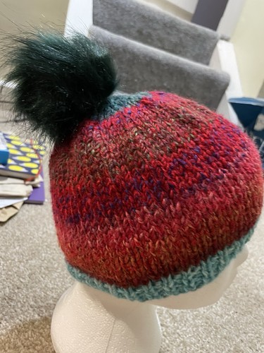 Hand knitted bobble - hand, hat