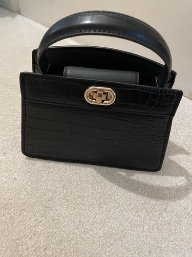 Black handbag - black,