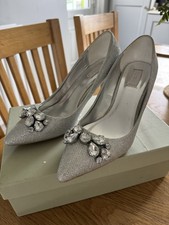 Silver shoes by Untold Size6